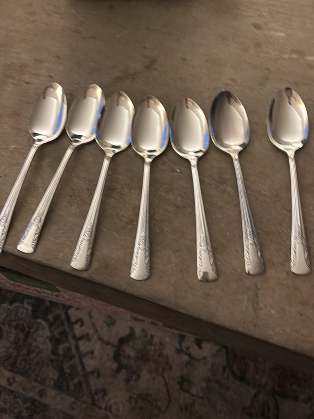 7 VINTAGE CAMELIA SILVERPLATE SOUP SPOONS